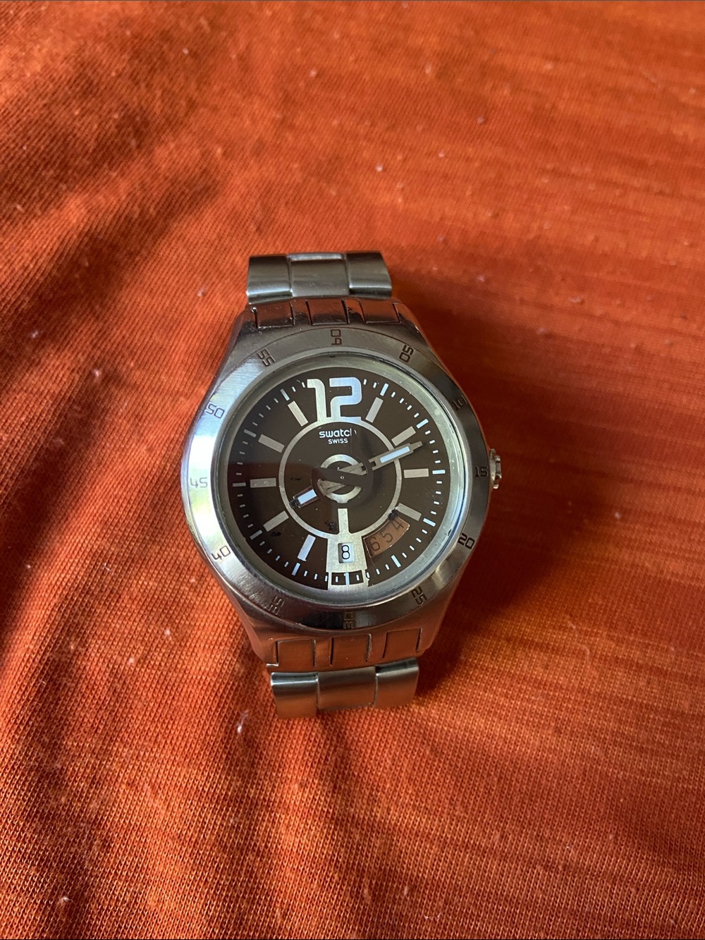 Swatch Silver Stainless Steel Watch with Black Dial and White Accents